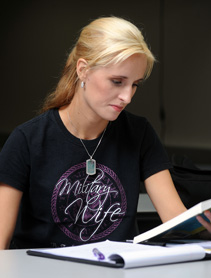 Image of a student wearing a Military Wife shirt.