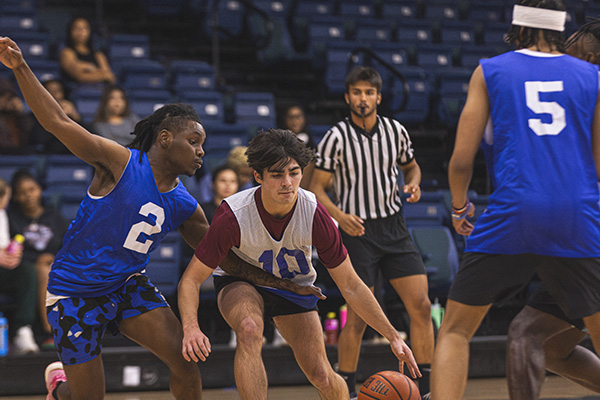 UWF students playing intramural basketball