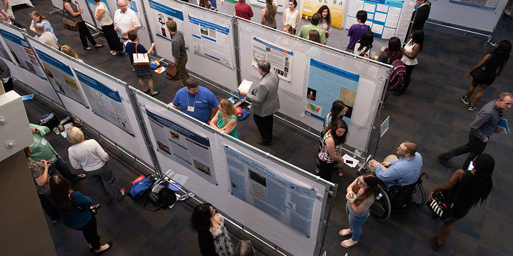 Students displaying the results of their research.