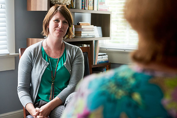 social worker listening to a client